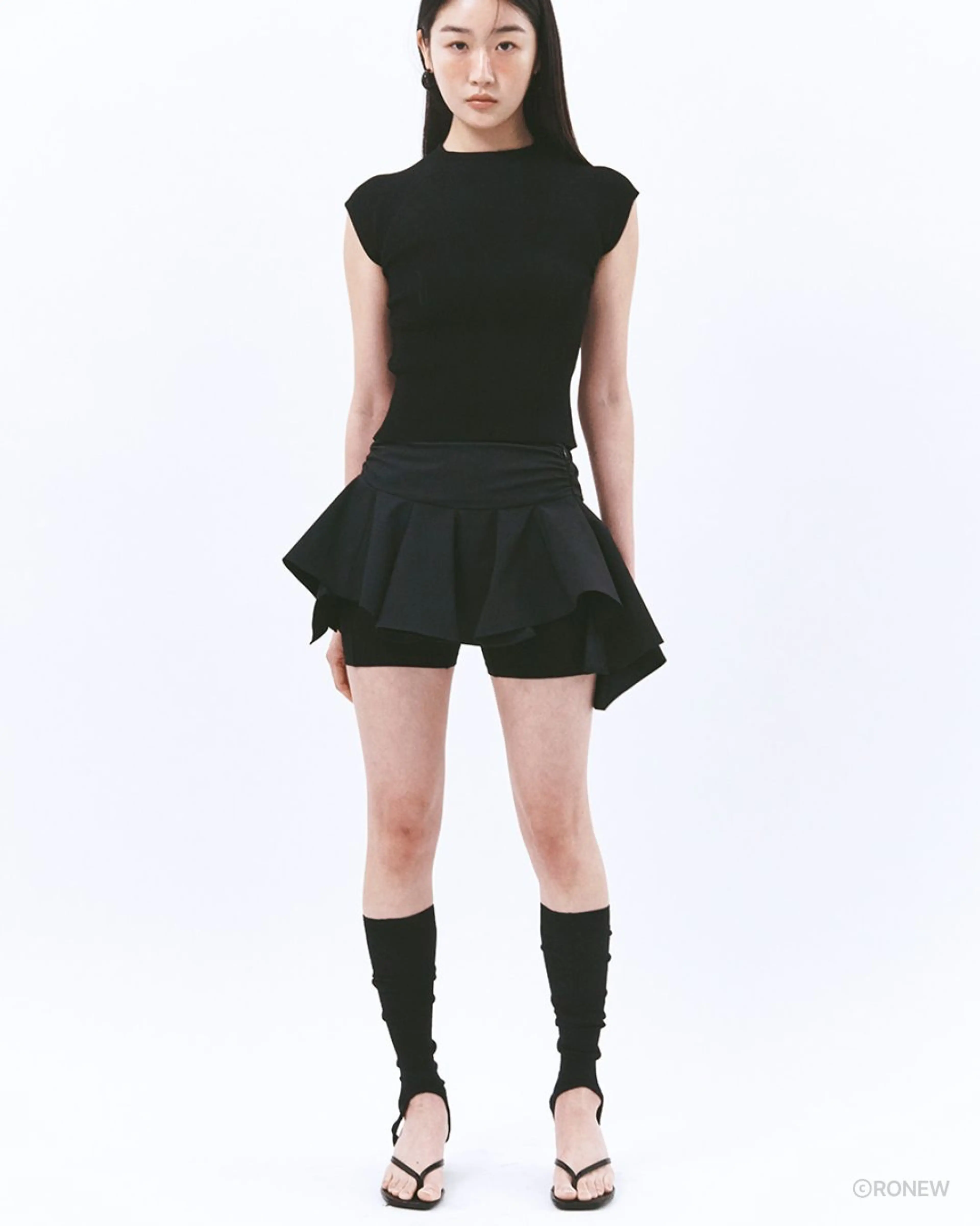 로뉴 Asymmetric Culotte Frill Mini Skirt